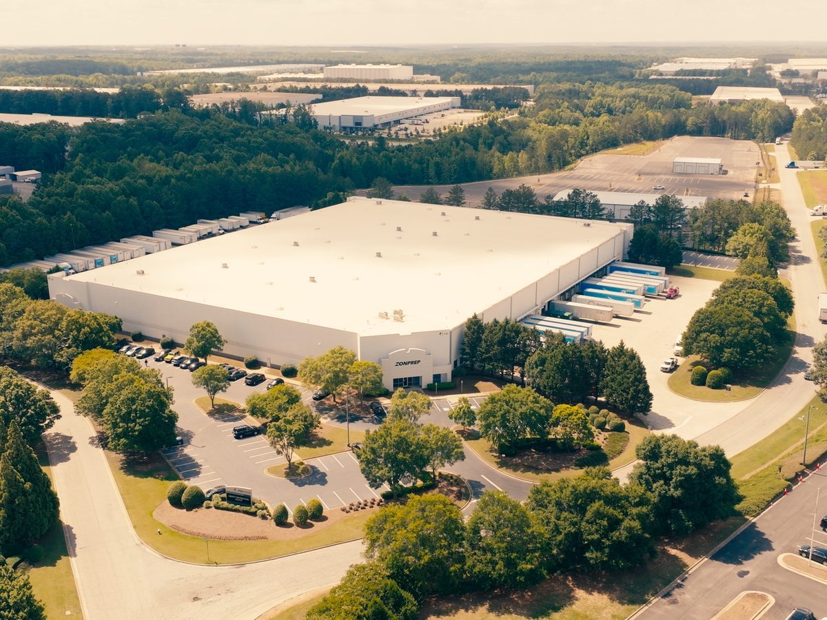 Aerial view of ZonPrep's warehouse in McDonough, Georgia, with trailers lined up at the loading docks