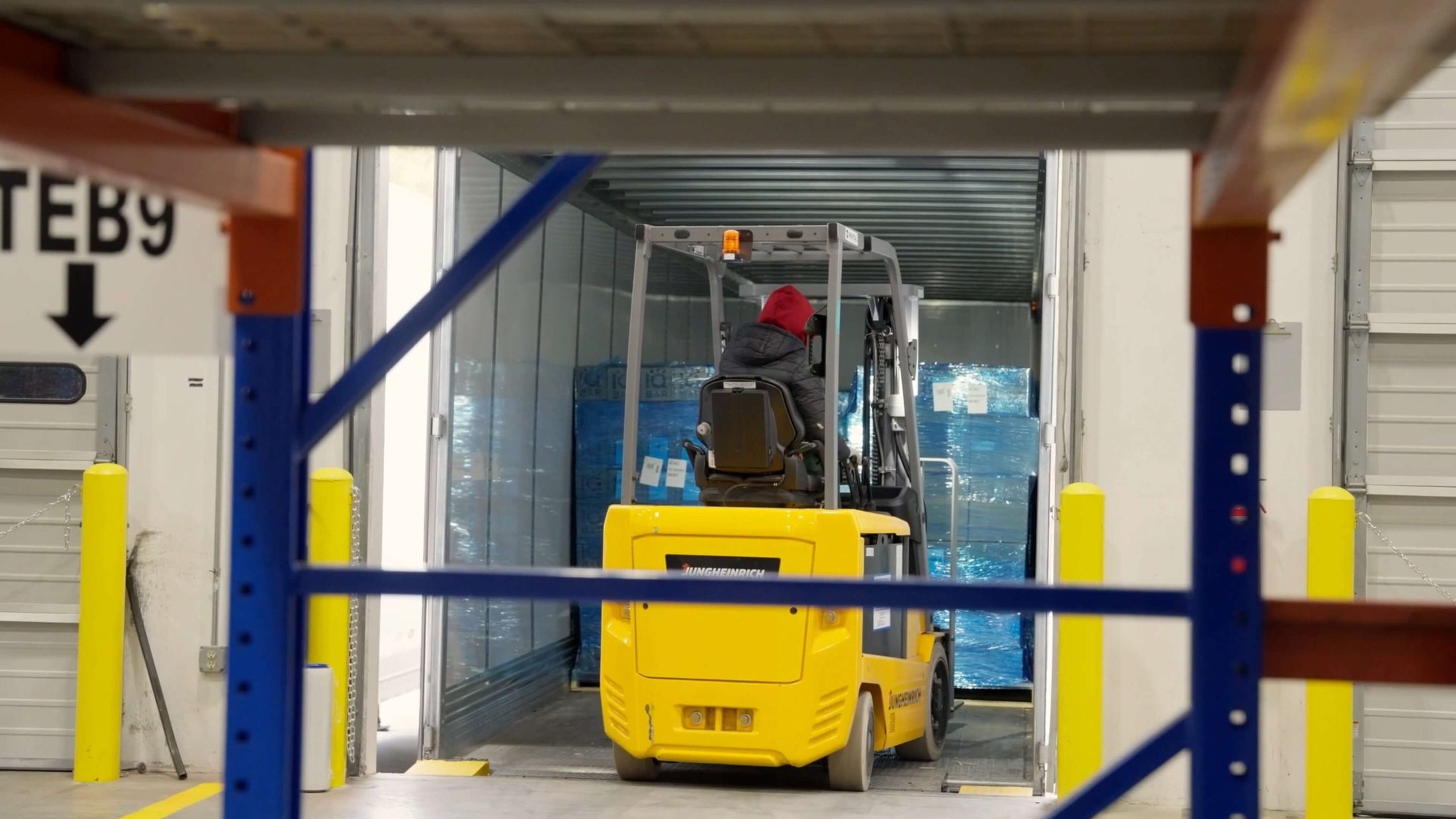 Reach truck operating in the racking aisles of the ZonPrep warehouse