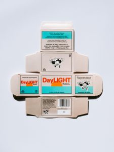 Product packaging with a barcode on one side